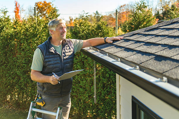 Professional Hail Damage Roof Repair technician working in Plainfield, PA
